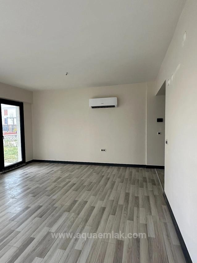 3+1-Zimmer-Wohnung In Köyceğiz Zu Vermieten, Erdgeschoss, Alle Zimmer Klimatisiert, In Einer Wohnanlage Mit Zugangskontrolle.