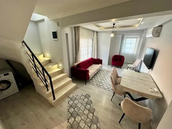 Im Zentrum von Köyceğiz klimatisiert und möbliert Duplex 3+1 Wohnung