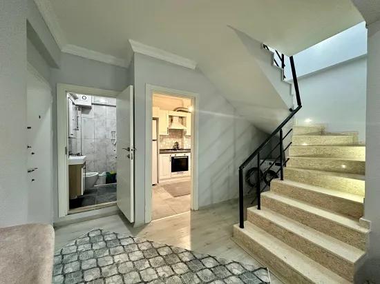 Im Zentrum von Köyceğiz klimatisiert und möbliert Duplex 3+1 Wohnung
