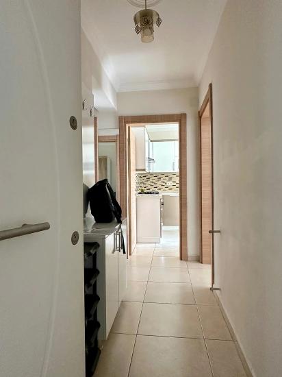 Apartment For Rent In Köyceğiz Town Center. Ground Floor, 2+1 Bedrooms, Closed Kitchen & Air Conditioning.