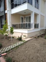 Apartment For Rent In Köyceğiz Town Center. Ground Floor, 2+1 Bedrooms, Closed Kitchen & Air Conditioning.