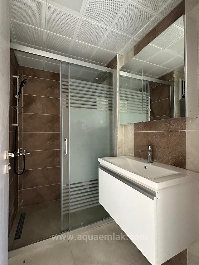 Köyceğiz De Site İcinde Bahçe Kat Tum Odalari Klimali 2+1 Kiralik Daire