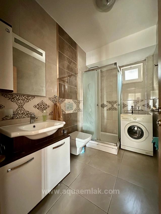 Köyceğiz Merkezde Kiralık Daire. Bahçe Katı 2+1 Kapalı Mutfak & Klimalı